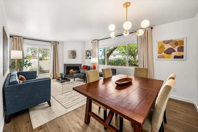 a bedroom with a bed a couch and dresser