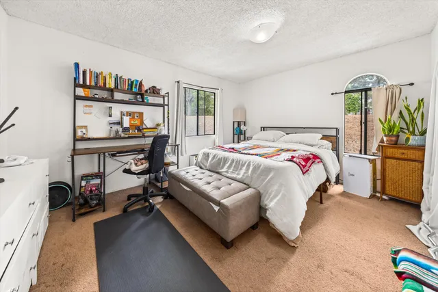 a black and white photo of a living room
