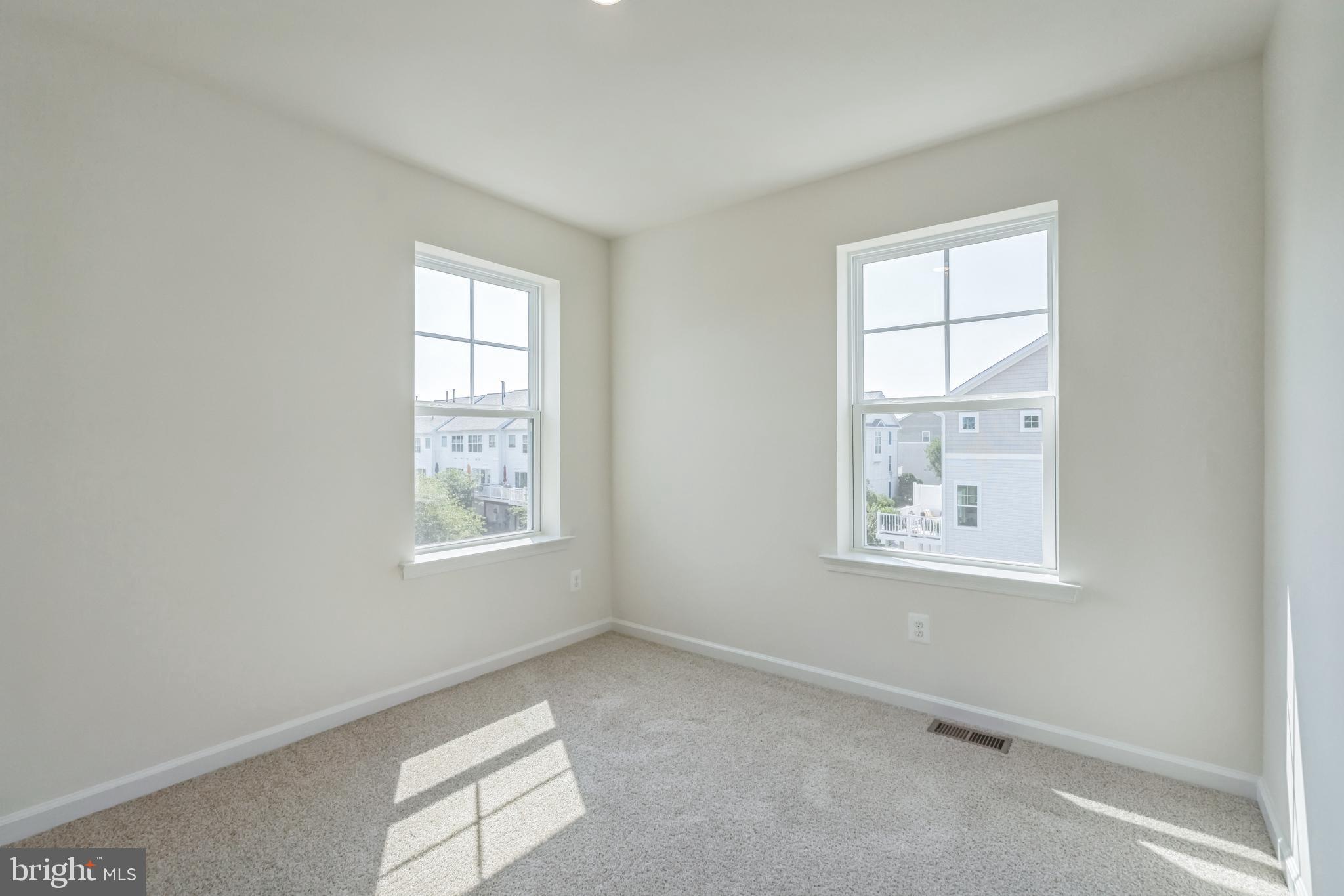 2 Riverside Wharf Cambridge, MD 21613 - Photo 13 of 38 an empty room with windows