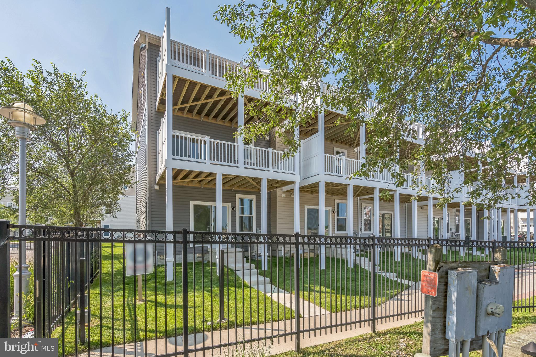 2 Riverside Wharf Cambridge, MD 21613 - Photo 19 of 38 swimming pool view from a balcony