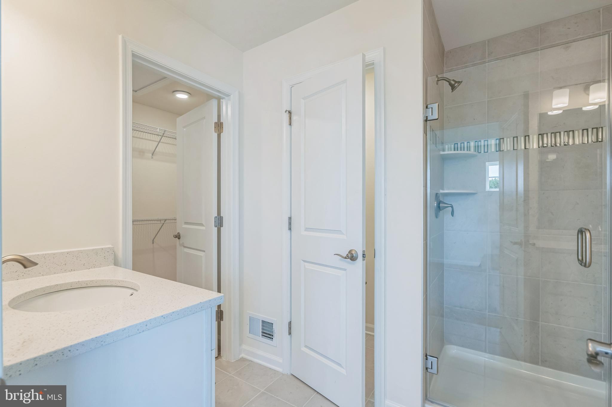 2 Riverside Wharf Cambridge, MD 21613 - Photo 9 of 38 a bathroom with a sink and a mirror