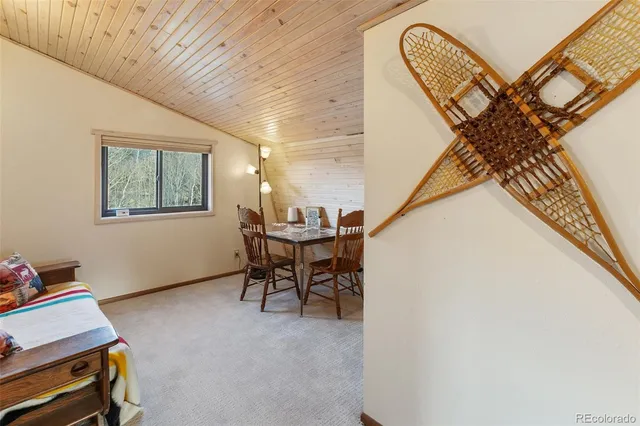 a workspace with furniture and a window