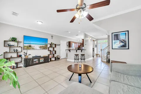 a living room with furniture and a table