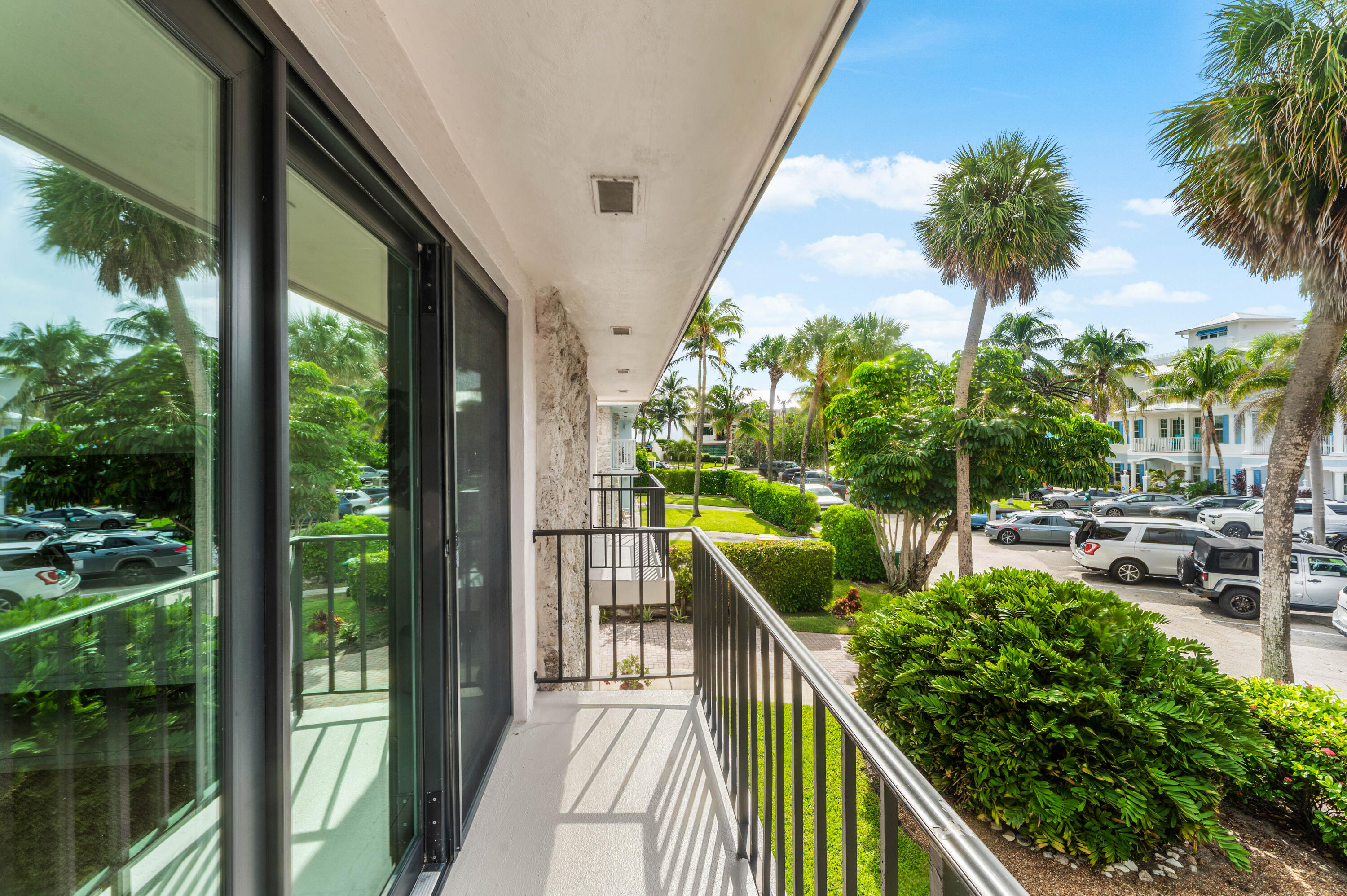 291 Mercury Road, Unit 4 Juno Beach, FL 33408 - Photo 23 of 35 Living Room Balcony