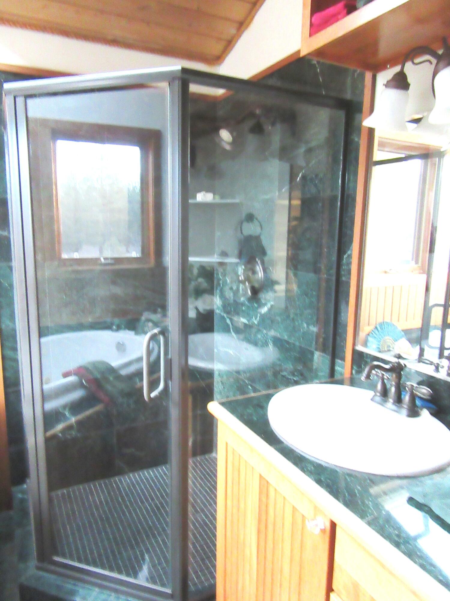 16144 Sprague River Road Chiloquin, OR 97624 - Photo 33 of 81 Marble Shower Primary Suite