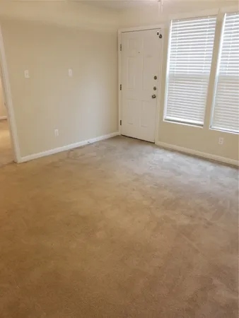 a view of a kitchen with storage and utility