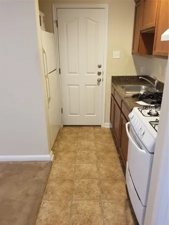 an empty room with a bathroom