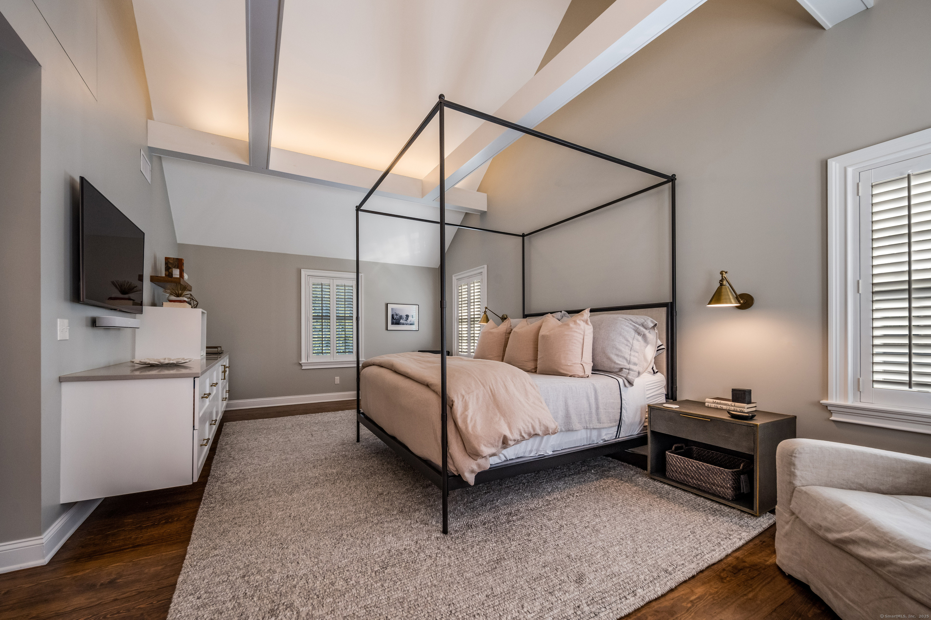 137 Liberty Street Madison, CT 06443 - Photo 12 of 40 a bedroom with a bed couch and a window