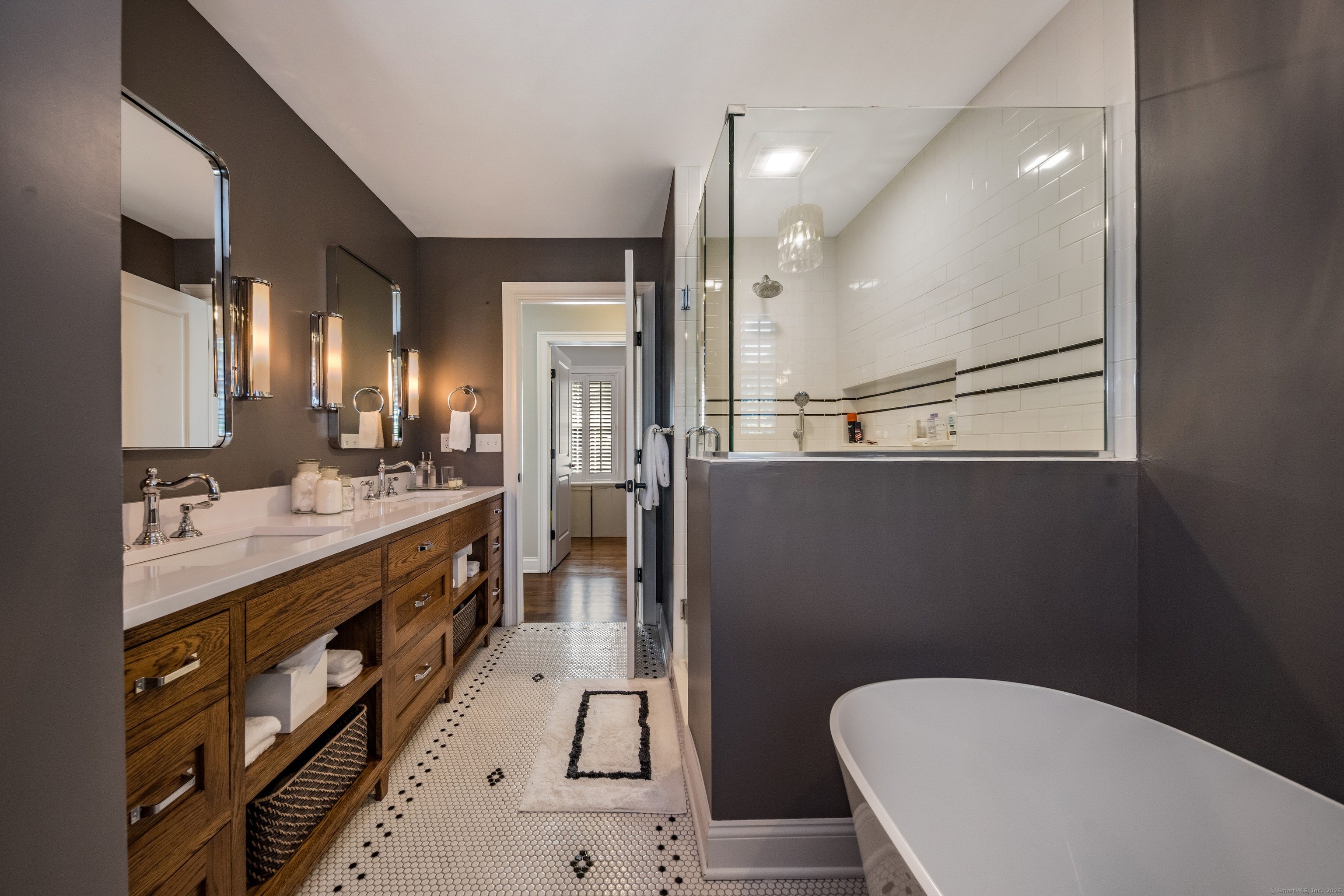 137 Liberty Street Madison, CT 06443 - Photo 14 of 40 a bathroom with a sink a toilet a mirror and shower