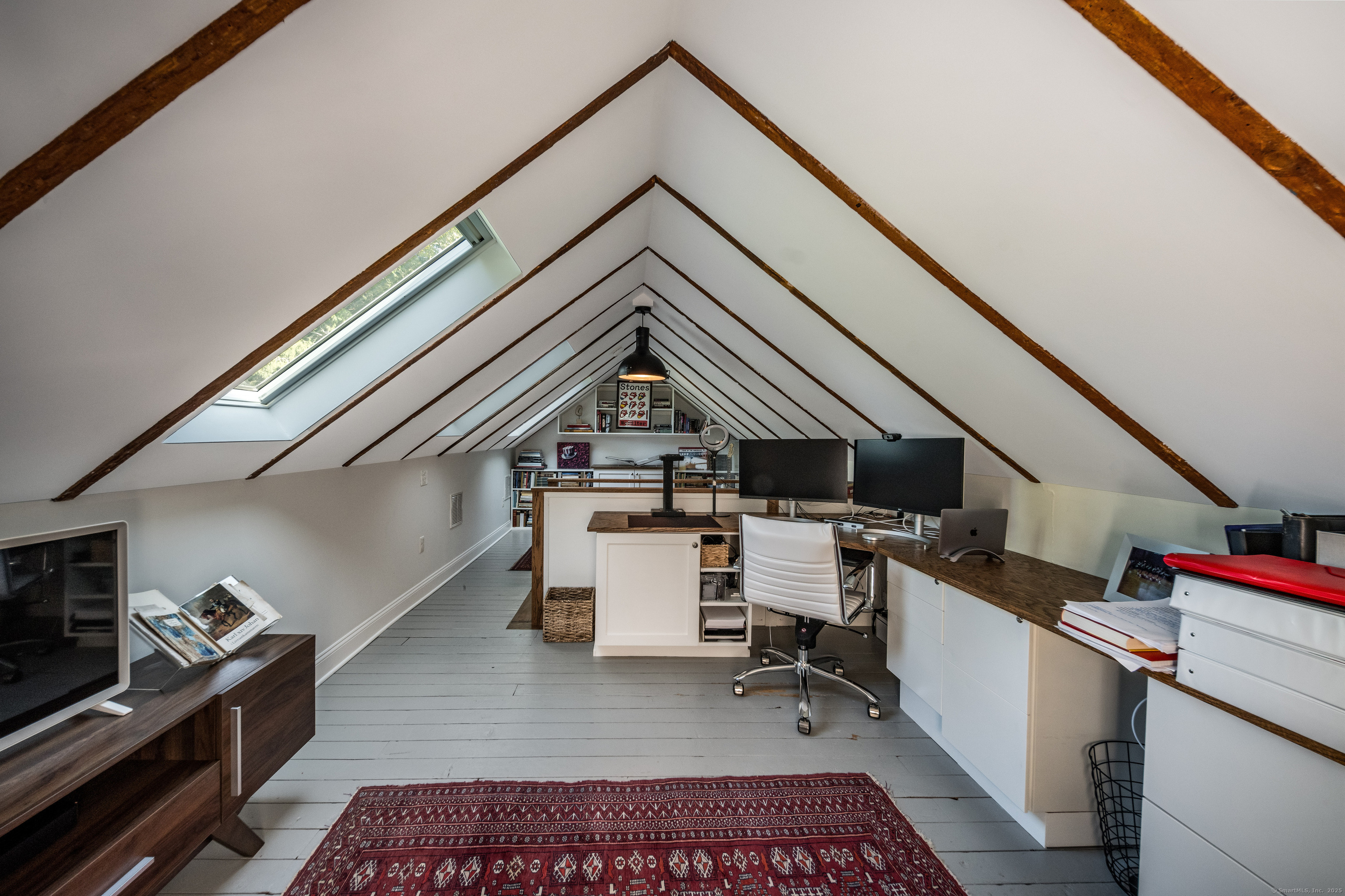 137 Liberty Street Madison, CT 06443 - Photo 21 of 40 a view of storage and utility room