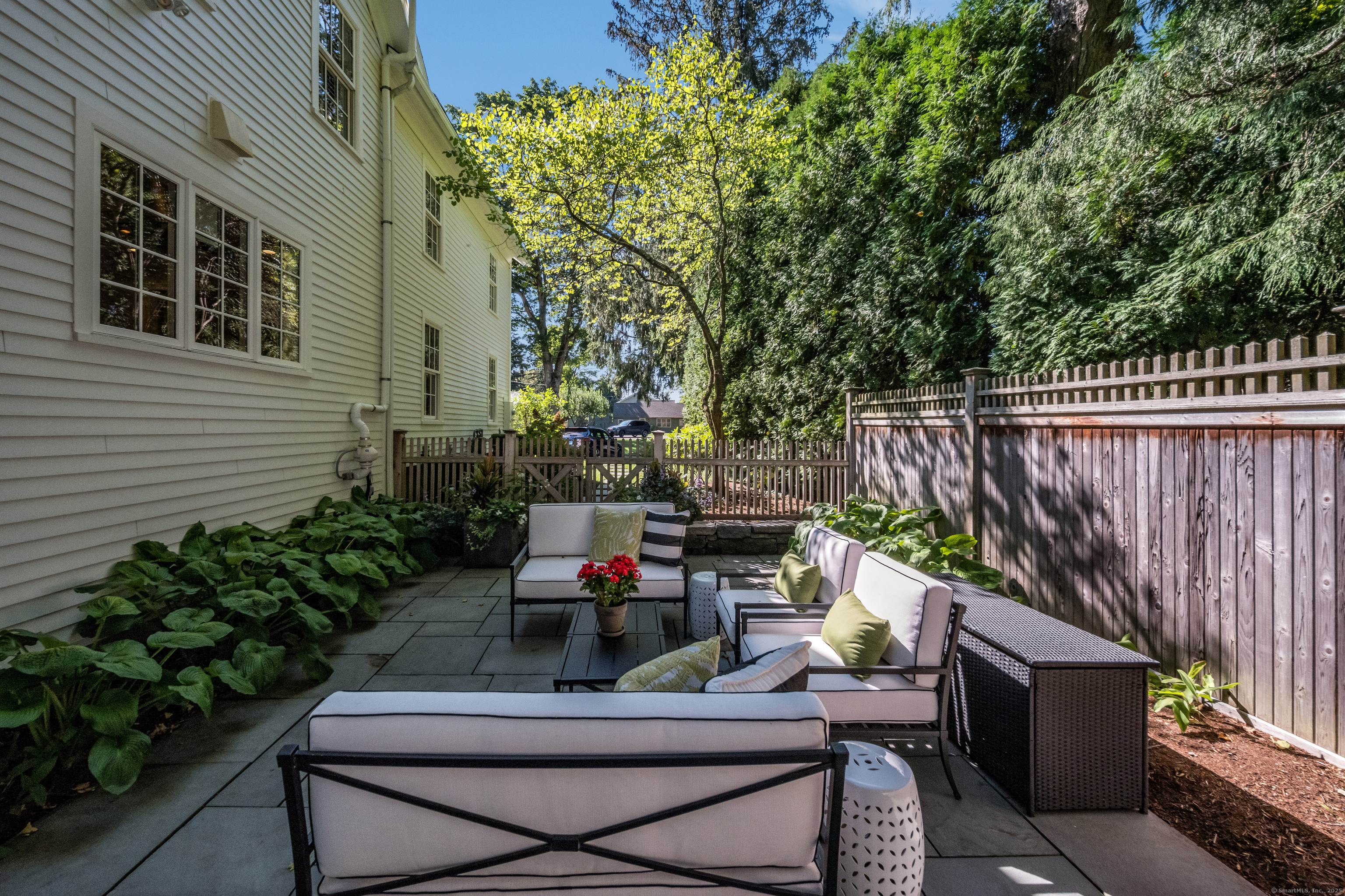 137 Liberty Street Madison, CT 06443 - Photo 29 of 40 a view of backyard with outdoor seating and green space