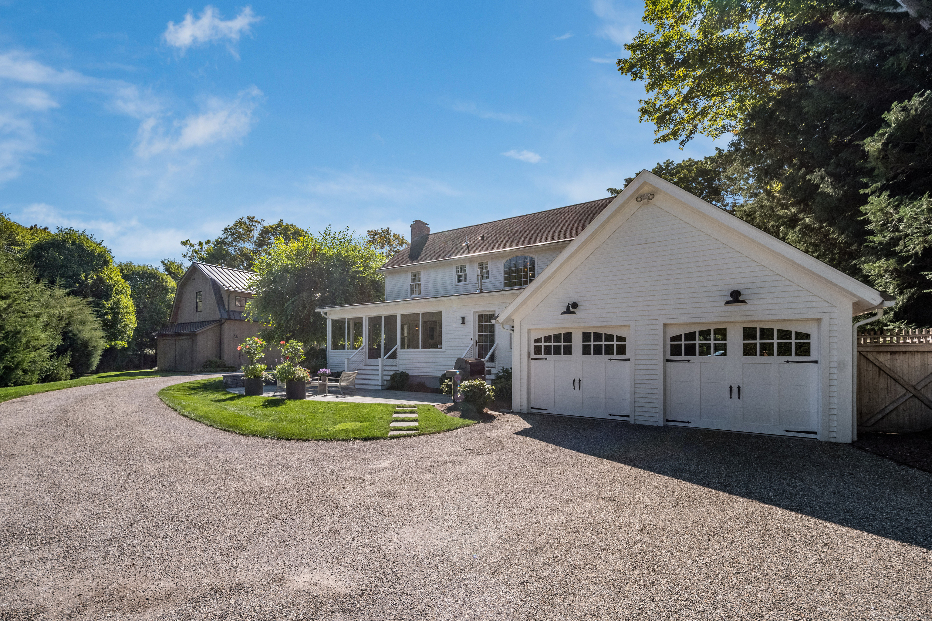 137 Liberty Street Madison, CT 06443 - Photo 30 of 40 a view of a house with backyard and sitting area