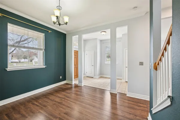 a view of entryway with wooden floor