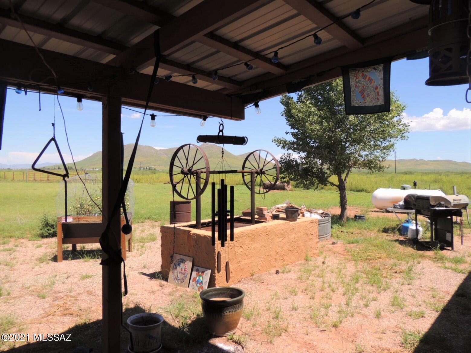 3454 East Fawn Ranch Road Pearce, AZ 85625 - Photo 11 of 49 a view of a porch with furniture