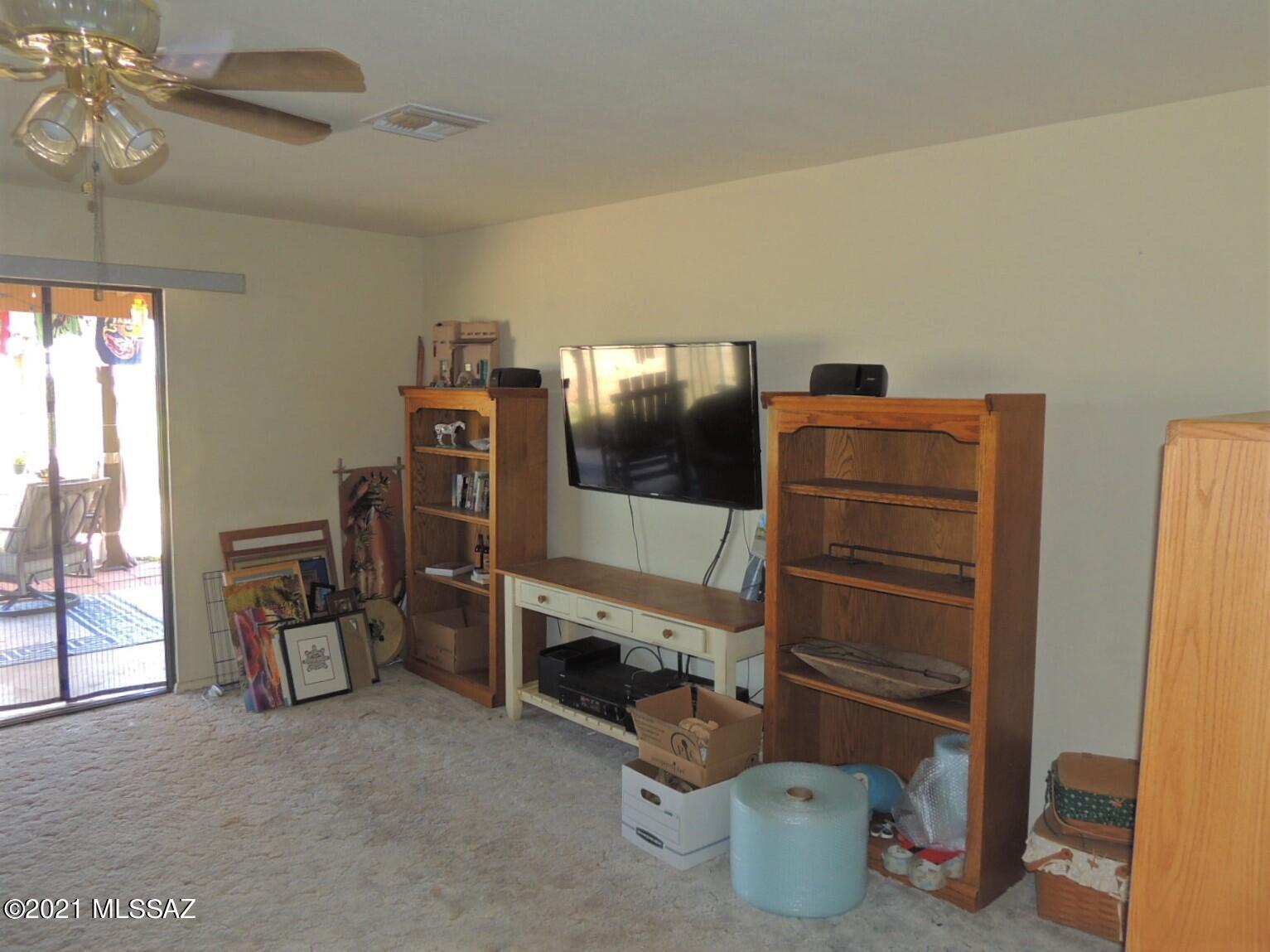 3454 East Fawn Ranch Road Pearce, AZ 85625 - Photo 15 of 49 a room with gym equipment