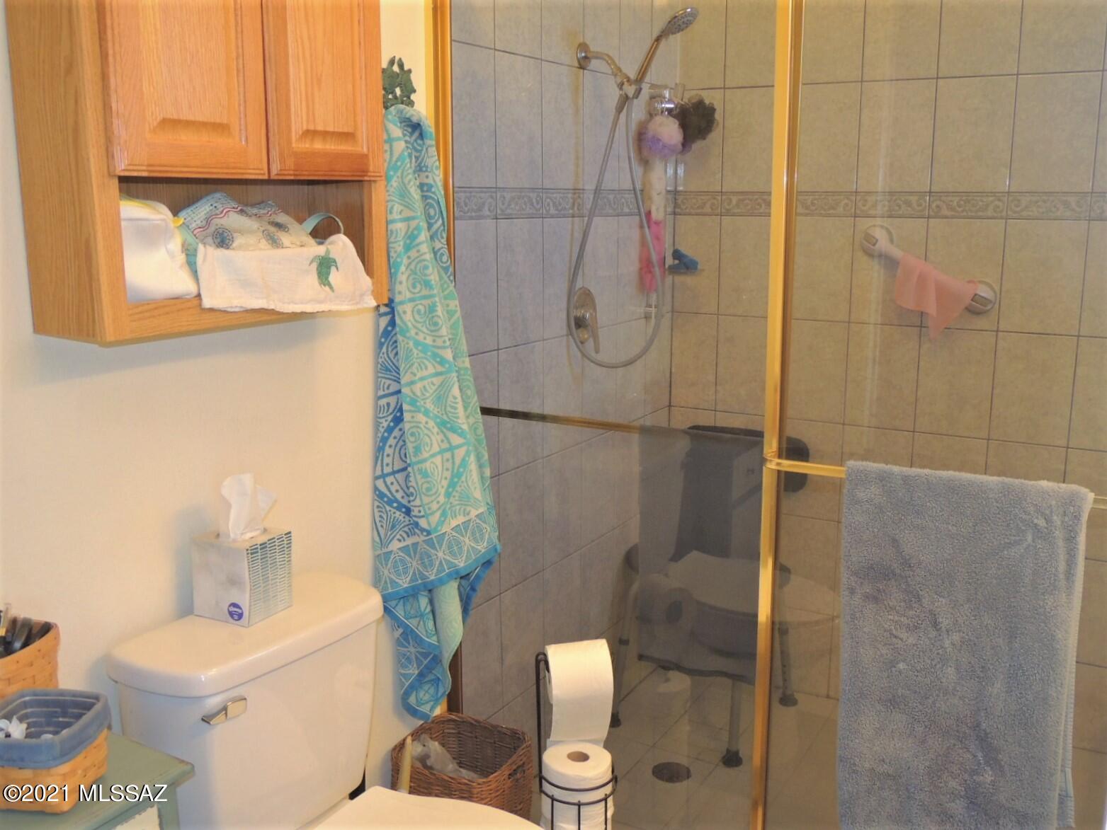 3454 East Fawn Ranch Road Pearce, AZ 85625 - Photo 25 of 49 a bathroom with a shower and a toilet