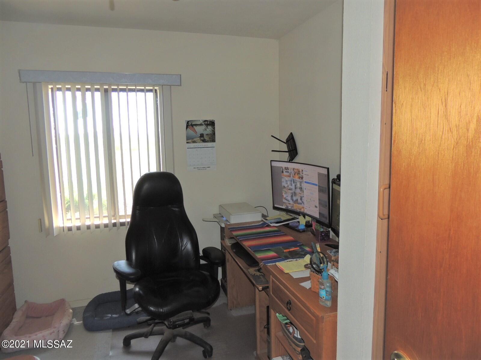 3454 East Fawn Ranch Road Pearce, AZ 85625 - Photo 29 of 49 a view of workspace with a window