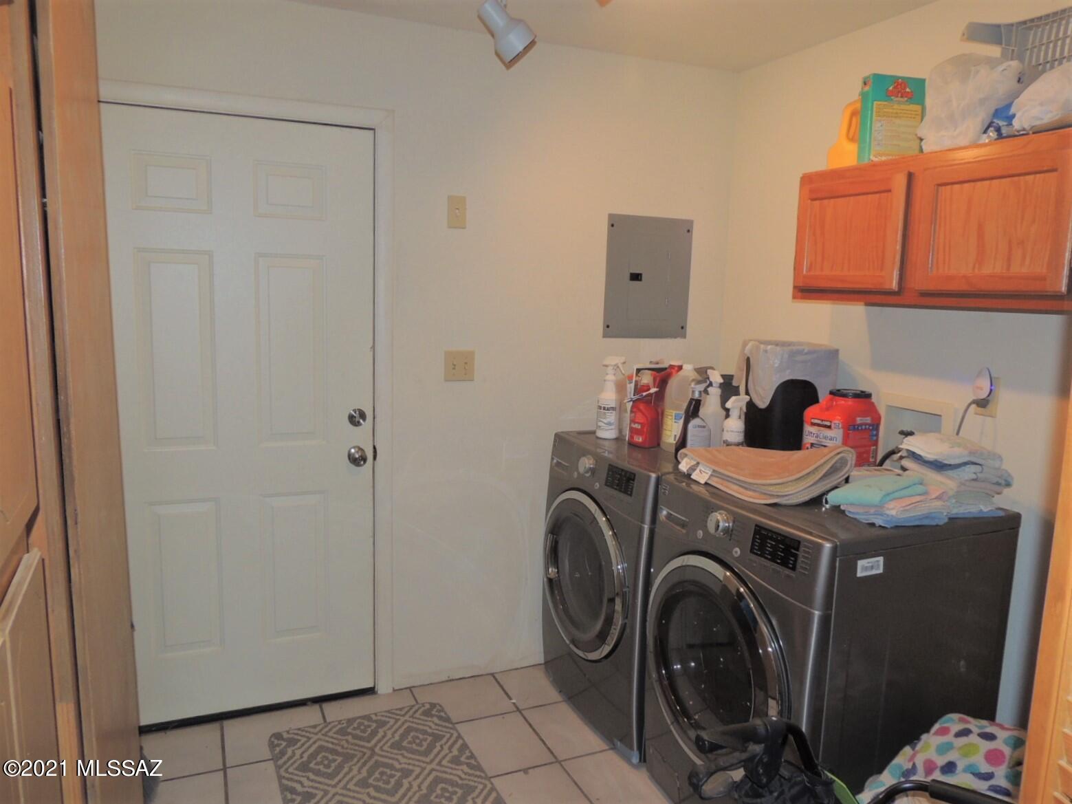 3454 East Fawn Ranch Road Pearce, AZ 85625 - Photo 31 of 49 a utility room with sink dryer and washer