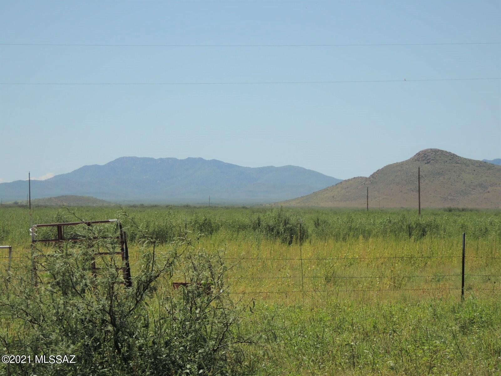 3454 East Fawn Ranch Road Pearce, AZ 85625 - Photo 48 of 49 a view of lake with mountain in the background