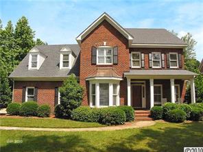 448 South Sharon Amity Road Charlotte, NC 28211 - Photo 1 of 16 a front view of a house with a yard