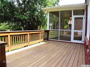 448 South Sharon Amity Road Charlotte, NC 28211 - Photo 14 of 16 a view of backyard with deck and wooden floor
