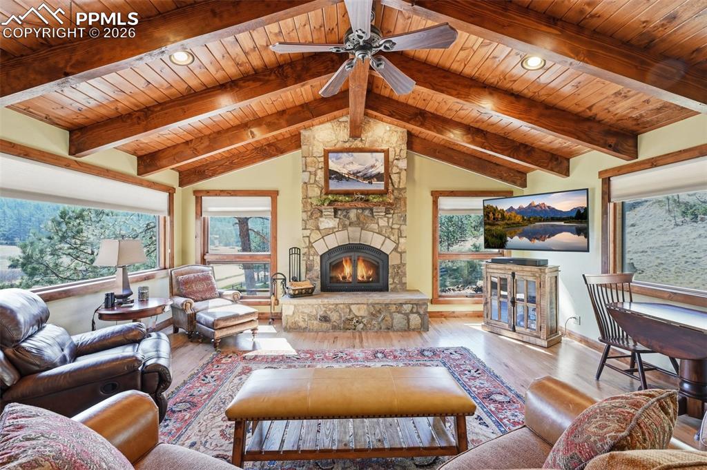 89 Ranch View Road Florissant, CO 80816 - Photo 14 of 50 Soaring cathedral ceilings and surrounding picture windows perfectly frame this great living area.