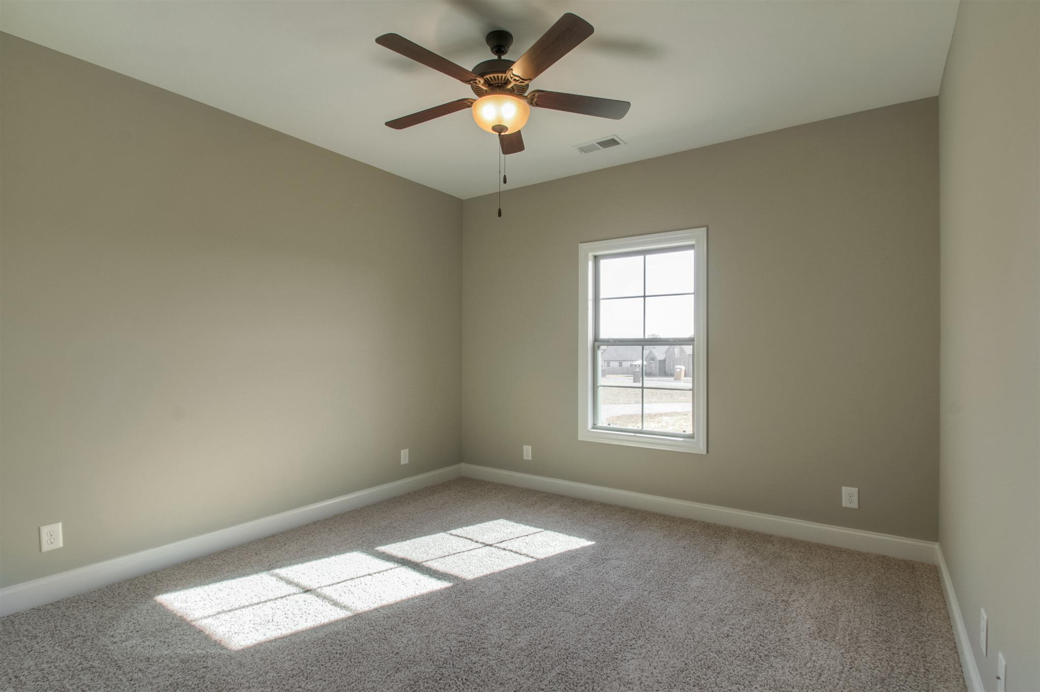1 Bates Road Lebanon, TN 37087 - Photo 13 of 15 a view of an empty room and window and chandelier fan