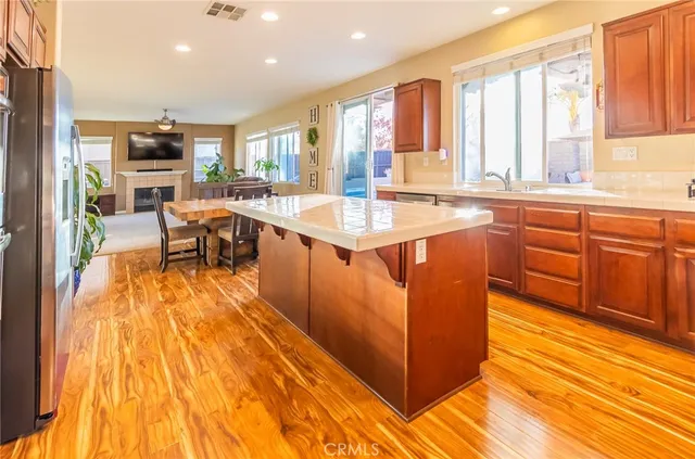 a living room with furniture and flat screen tv