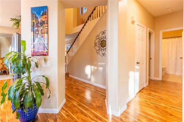 a bedroom with bed and a window