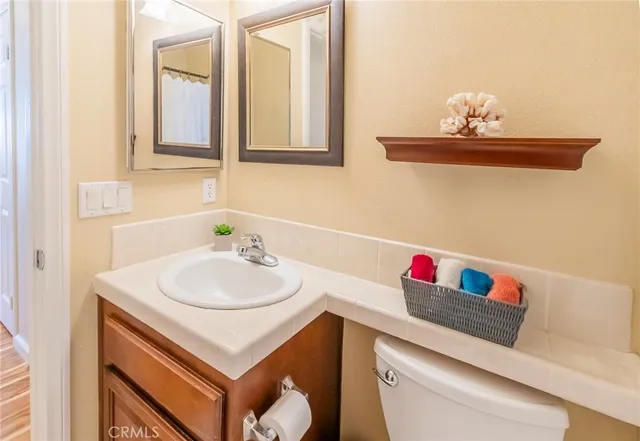 a view of a bathroom from a hallway
