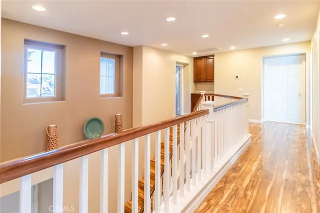a view of a dining room with furniture and a window