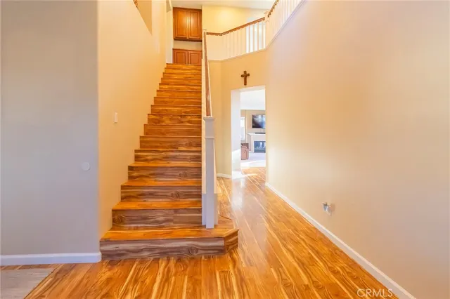 a spacious bathroom with a tub sink and mirror