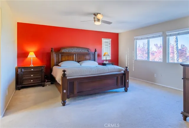 a utility room with cabinets washer and dryer