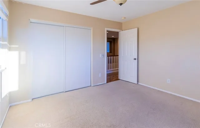 an aerial view of a house with a yard and potted plants