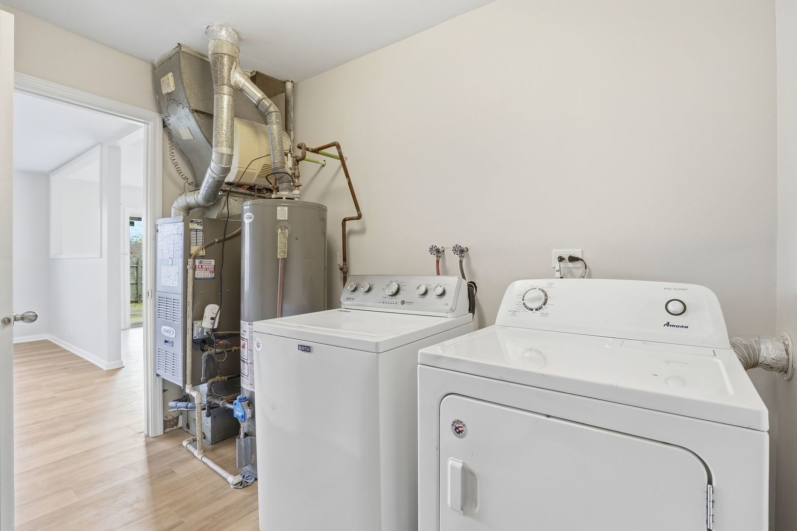 221 Davis Lane Bolingbrook, IL 60440 - Photo 11 of 24 a utility room with dryer and washer
