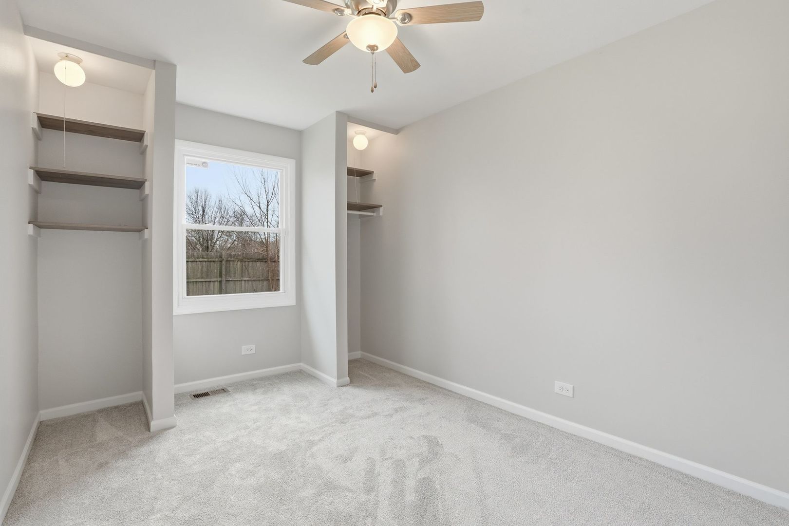 221 Davis Lane Bolingbrook, IL 60440 - Photo 15 of 24 wooden floor in an empty room with a window