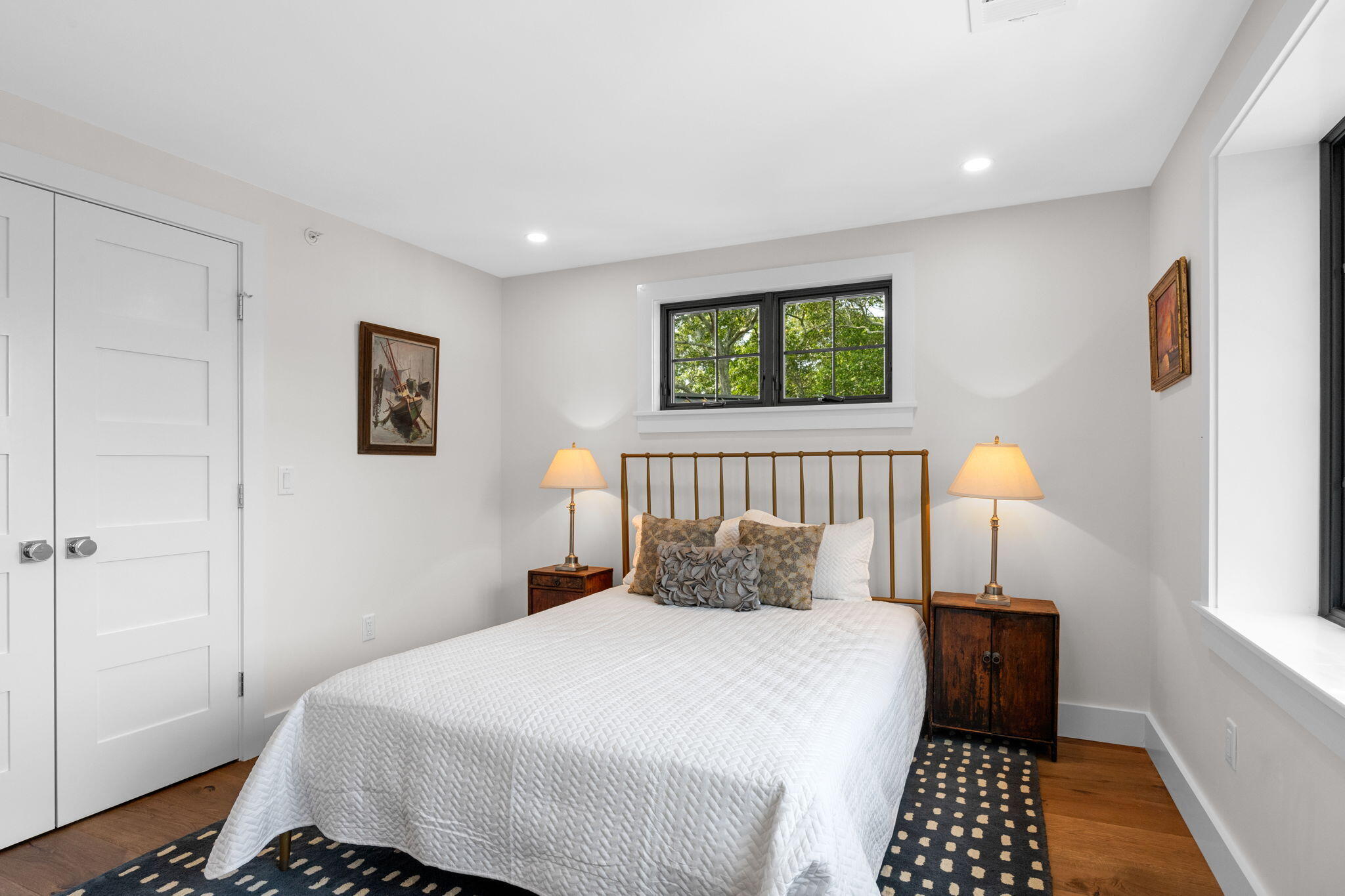 50 Nelson Avenue, Unit 8 Provincetown, MA 02657 - Photo 11 of 21 a bedroom with a bed and a window