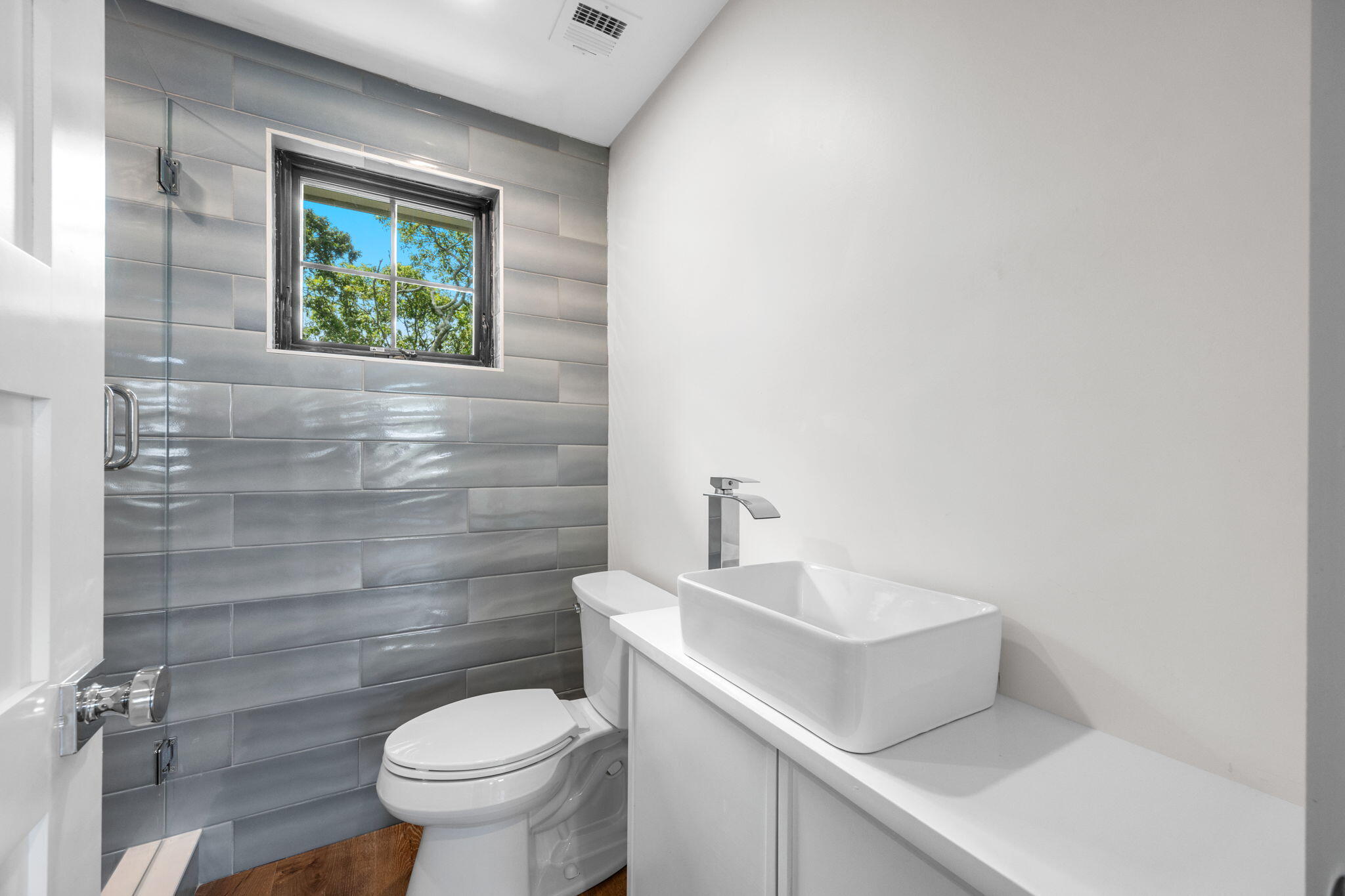 50 Nelson Avenue, Unit 8 Provincetown, MA 02657 - Photo 15 of 21 a bathroom with a toilet sink and mirror
