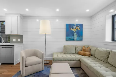 a living room with furniture and a couch