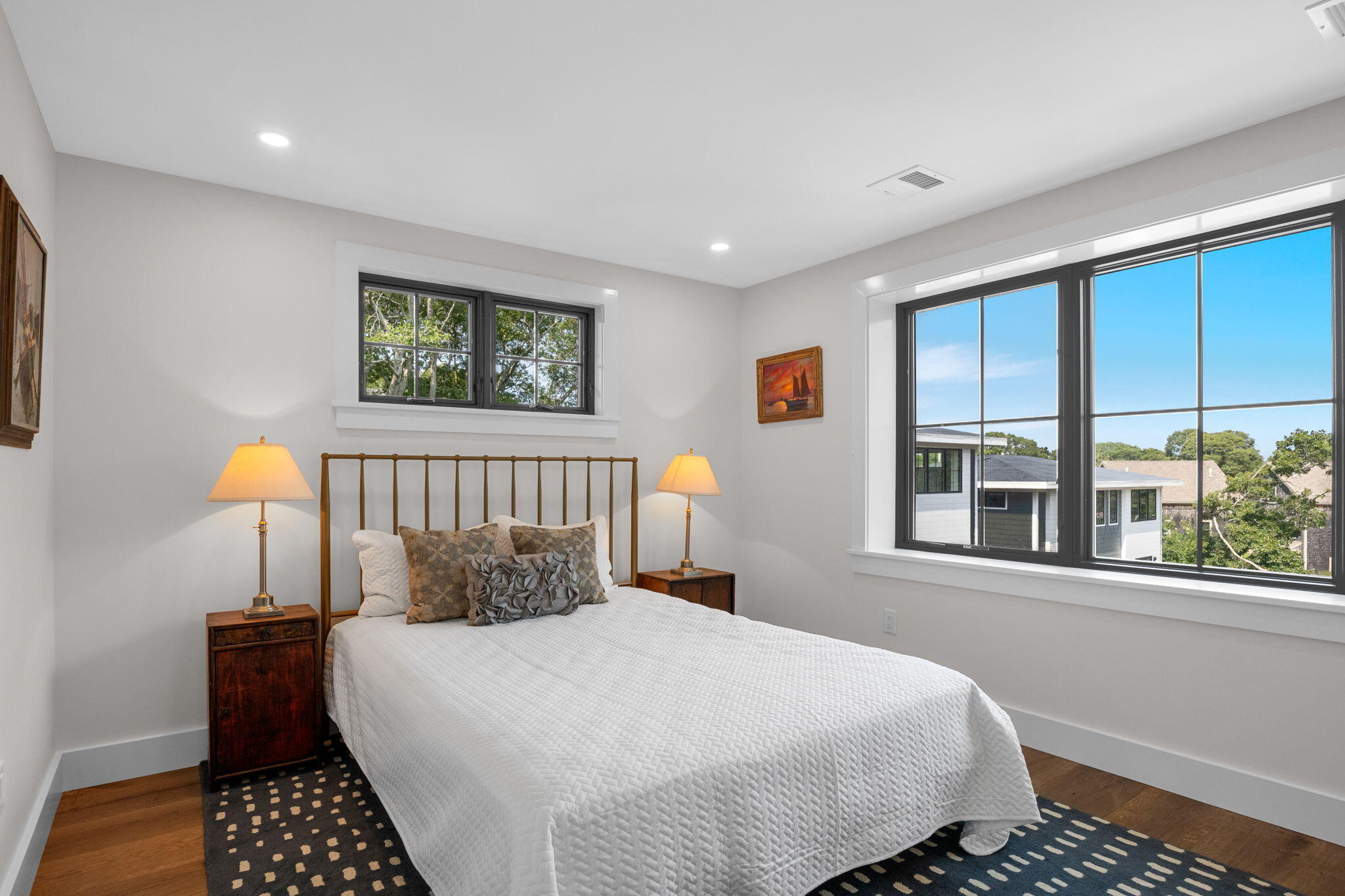 50 Nelson Avenue, Unit 8 Provincetown, MA 02657 - Photo 10 of 21 a bedroom with a bed and a window