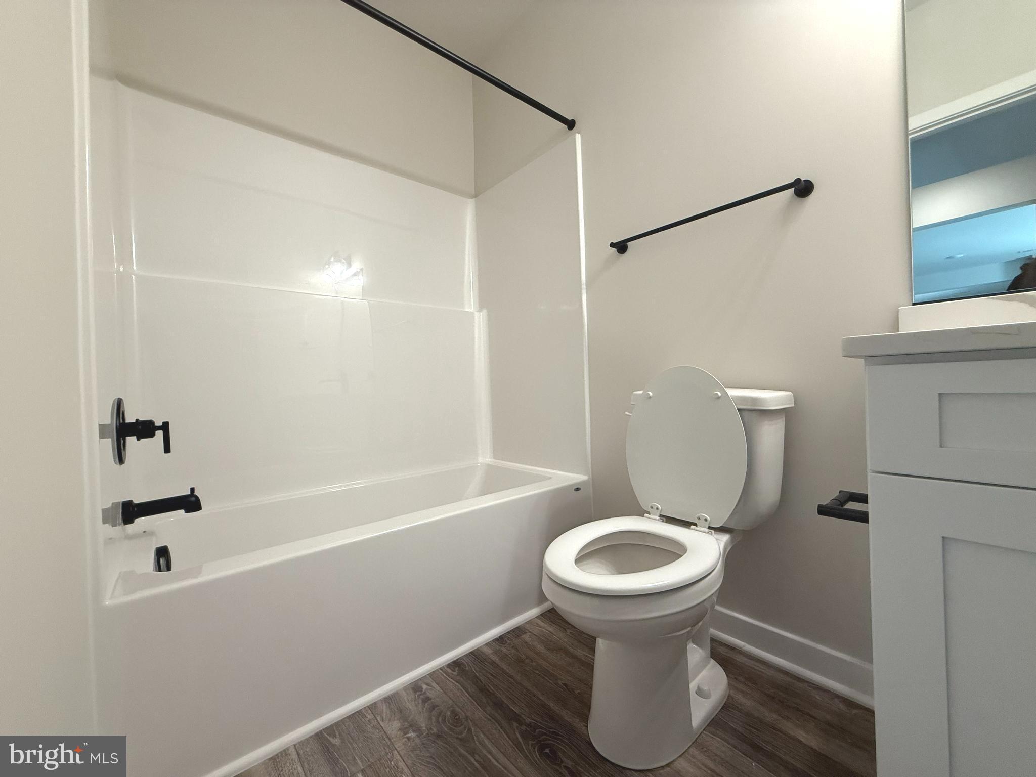 155 Norman Road Stafford, VA 22554 - Photo 52 of 55 a bathroom with a toilet and a bathtub