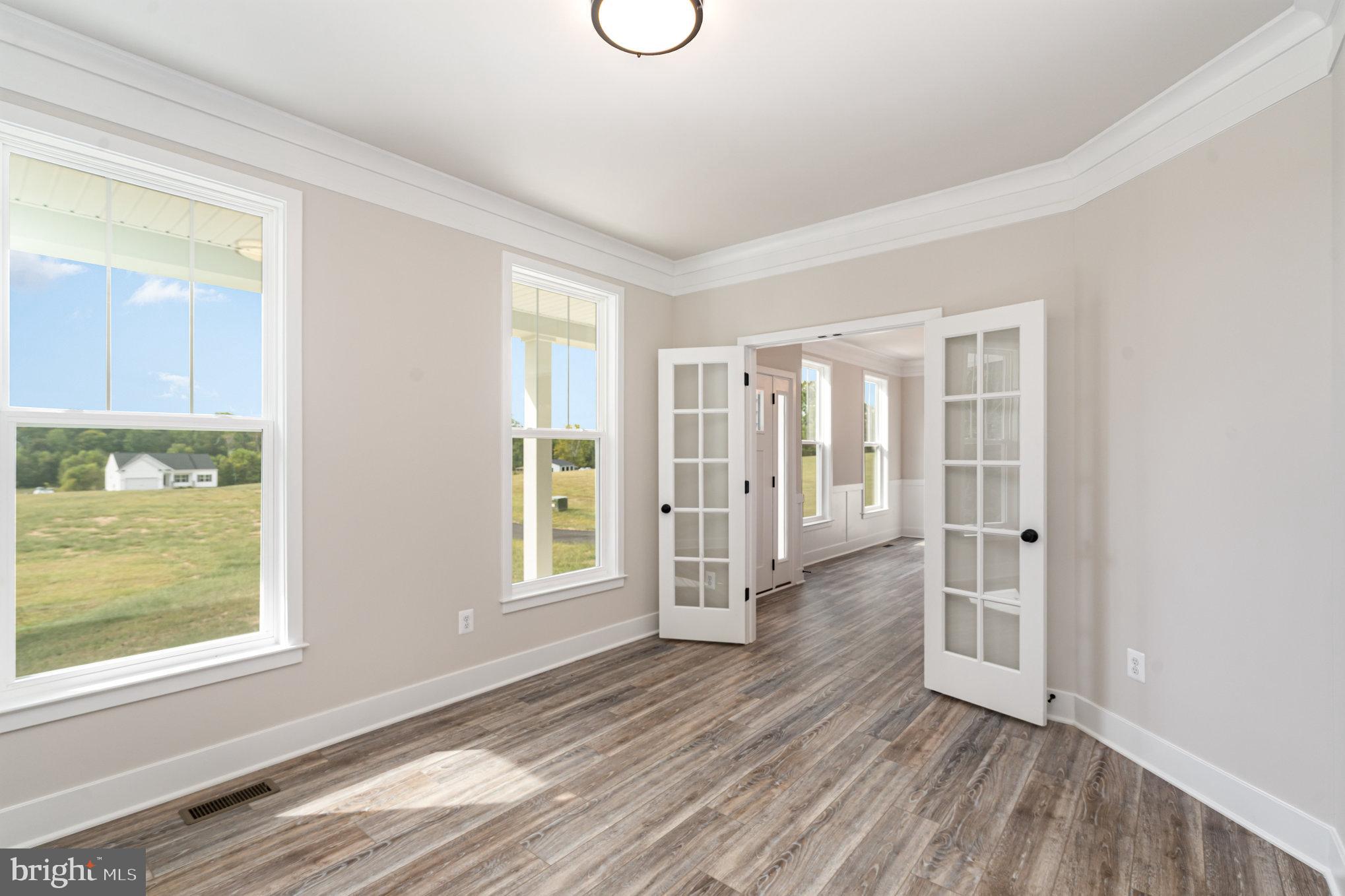 155 Norman Road Stafford, VA 22554 - Photo 6 of 55 a view of livingroom with furniture and wooden floor