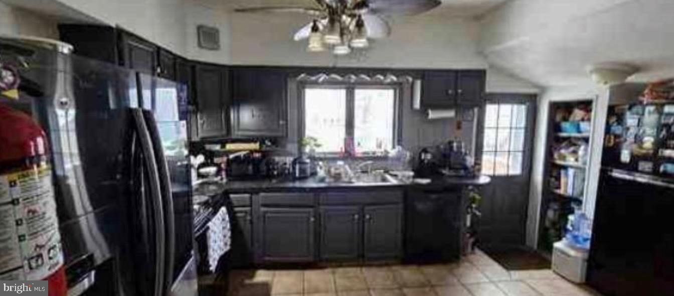264 Birch Street Carneys Point, NJ 08069 - Photo 2 of 5 Modern kitchen with sleek finishes.