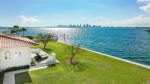 a view of a lake from a yard