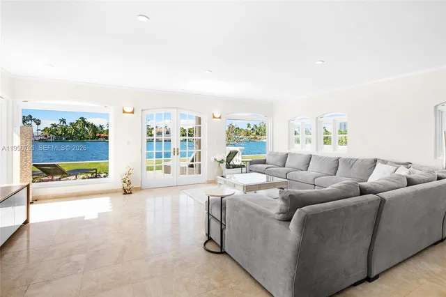 a view of a swimming pool and lounge chair