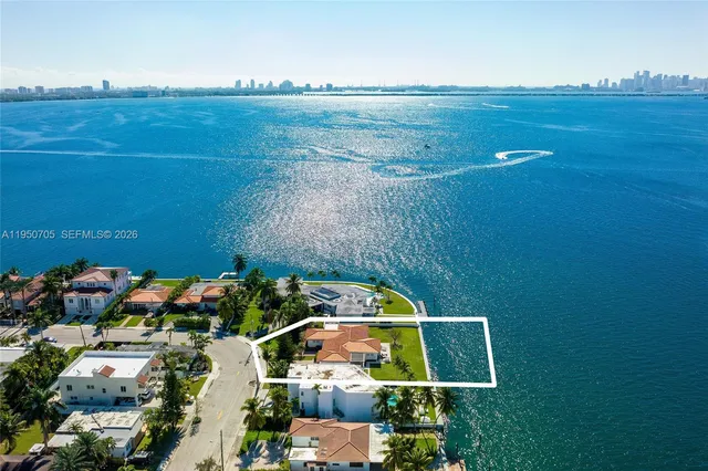 an aerial view of a house with outdoor space