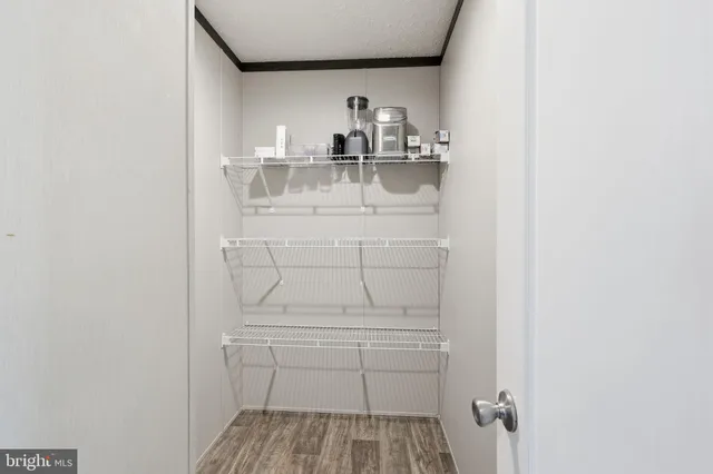 a bathroom with a sink and vanity