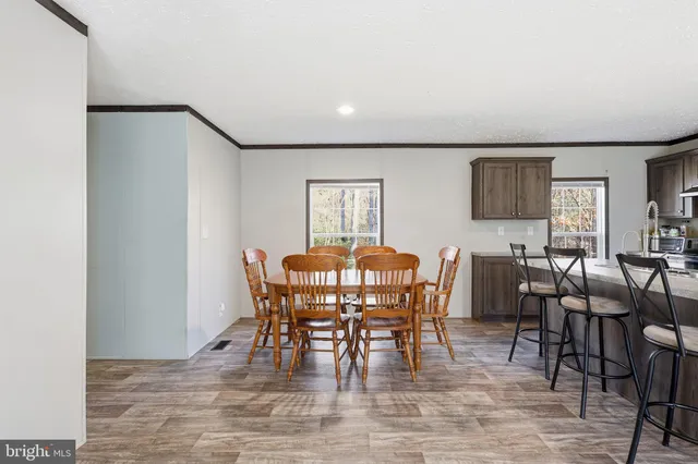 a view of a dining room with furniture