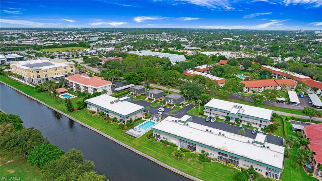 600 Valley Stream Drive, Unit C1 Naples, FL 34113 - Photo 34 of 44 Bird's eye view of a nearby body of water