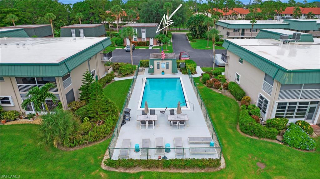 600 Valley Stream Drive, Unit C1 Naples, FL 34113 - Photo 43 of 44 Bird's eye view of a pool area
